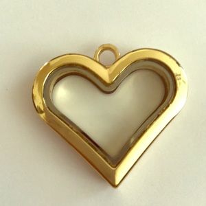 Gold toned lucite/plastic heart pendant